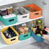 Cesta de almacenamiento de plástico simple transfronteriza para escritorio del hogar, caja organizadora de cosméticos y artículos varios con asa, al por mayor