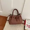 Bolso Pequeño de Textura de Moda para Mujer 2026 Nuevo Otoño Nicho Bolso Cruzado Sencillo Estilo Coreano Bolso de Cubo Plegado de Mano