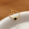 Anel de Trevo de Quatro Folhas da Sorte Feminino Luxo Leve Design de Nicho Personalidade Abertura Ajustável Diamantes Brilhantes Exquisito Fashionável Retro Anel de Dedo Atacado