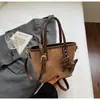 2025 Nueva Popular Bolso de Mano Pequeño de Color Contrastante Moda Femenina Retro Bolso Cubo Puntadas Texturizadas Bolso de Hombro Único Cruzado