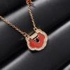 Collar con llave de cerradura Ruyi de Seiko, versión alta, para mujer, chapado en oro rosa de 18 quilates, con diamantes y calcedonia roja, colgante para el cabello