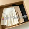 Pantalones de maternidad para verano, shorts finos de algodón y lino para usar al aire libre, pantalones casuales de pierna ancha a la moda de corte holgado, ropa de maternidad para verano