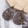 Aretes de madera más vendidos de comercio electrónico transfronterizo, moda europea y americana, aretes de madera geométricos huecos exagerados hechos a mano