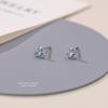 Serie azul aretes pequeños y frescos de flor de iris para mujer plata de ley s999 moda coreana aretes de estrella de circonita estrella de ocho puntas
