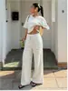2026 Verano Nuevo Conjunto de Dos Piezas de Pantalones Anchos de Manga Corta de Punto Rayado Conjunto de Moda Casual para Mujer Ropa Transfronteriza para Mujer