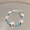 [Vacaciones en la Playa] Pulsera de Estrella de Mar de Concha Azul para Mujer, Pulsera de Accesorios de Cuentas de Isla, Pulsera Estilo Playa de Año Nuevo