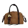 2026 Nova Bolsa Boston de Pelúcia Camurçada Retrô Bolsa de Mão Ombro Transversal Versátil com Senso de Design de Nicho Feminino