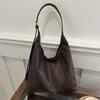 Bolsa de Mão Feminina Estilo Hong Kong Moda 2025 Nova Bolsa de Ombro Retrô Texturizada Verão Bolsa Tote Balde para Deslocamento