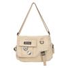 Nuevo bolso bandolera de lona japonesa de marca de moda para hombre, bolso de estudiante, bolso de hombro informal combinable para mujer.