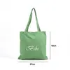 Bolsas de lona verdes para la compra, disponibles en una amplia gama de estilos, con impresión de logotipo personalizado y fabricación OEM/marca privada tanto para mercados nacionales como internacionales