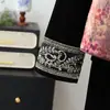 Nuevo conjunto de chaleco de otoño estilo chino para madres, nueva moda trendy 2026 para mujeres de mediana edad y mayores, elegante conjunto de tres piezas estilo nacional para dama