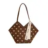 Bolsa de gran capacidad para mujeres que van al trabajo, nueva bolsa de mano de lunares de moda 2026, bolsa de hombro debajo del brazo simple y elegante
