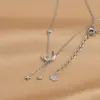 Corrente de clavícula elegante banhada a ouro real design de nicho feminino colar com borla longa zircônia colar de lua e estrela feminino