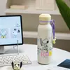 Botella de agua térmica Snoopy de acero inoxidable 316, diseñada para niñas, con un aspecto elegante, perfecta para que los estudiantes la usen en la escuela, cuenta con un asa para transportarla fácilmente y una tapa de tipo pop-up