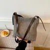 Bolso cubo tejido hueco transfronterizo 2026 nuevo de moda de alta gama para el hombro y cruzado gran capacidad versátil para el día a día
