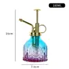 Al por mayor Nuevo Riego Retro Estampado Girasol Vitral Pequeña Regadera Presión Jardinería Tetera de Riego para Uso en Casa