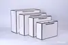 Bolsa de mano spot bolsa de papel bolsa gruesa para tienda de ropa empaque de compras bolsa de regalo logo impreso cinta de lazo