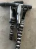 Partes de Camión Cisterna de Cemento a Granel Clip de Cadena Abrazadera de Tubo para Mortero Rodamiento de Bolas Aumentado Cadena de Acero Fundido Abrazadera de Canaleta de Descarga