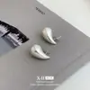 Pendientes Europeos y Americanos con Forma de Gota para Mujer, Textura Metálica, Estilo Minimalista Elegante, Sensación de Alta Gama, Pendientes Más Vendidos Transfronterizos