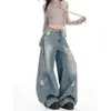 Jeans Azules Rasgados Estilo Retro Americano para Mujer, Temporada Primavera 2026, Adelgazantes Sueltos High Street de Pierna Ancha hasta el Suelo