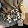 Bolso Pequeño de Lana de Cordero para Mujer 2025 Nuevo Diseño Coreano de Nicho Estampado de Leopardo Bolso para Teléfono Móvil Bolso Cruzado Versátil de Felpa