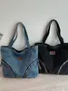 Bolso de mezclilla de gran capacidad, nuevo bolso de mano casual para el verano 2026, bolso tote de estilo relajado para mujer