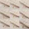 Nueva cadena de clavícula de lujo estilo coreano, collar versátil de acero de titanio de moda para mujer, colgante simple clásico de circón, accesorio versátil