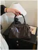 Bolsa tipo almohada de gran capacidad para mujer 2026 Nueva de alta gama de un solo hombro con temperamento retro versátil para el trabajo bolsa cruzada para mujer