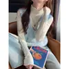 Suéter de punto de cachemira sintética para mujer, nueva colección de otoño 2026, cuello alto medio, manga larga, diseño calado, perfecto como capa interior o base para el invierno