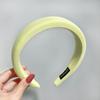 Diadema de caramelo de color macarrón con esponja y ala ancha primavera y verano alta sensación prenda exterior de verano top de calavera todo partido cabeza diadema femenina pelo