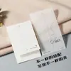 Etiquetas colgantes personalizadas para ropa, Etiquetas colgantes grandes anti-manipulación, Etiquetas de marca de moda en papel especial con adhesivo suave, Diseño de marca registrada para ropa de hombre y mujer, Logotipo