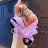 Chaveiro criativo de patinete elétrico de puxar, brinquedo divertido para aliviar o estresse para estudantes, pequena mercadoria para bancas, atacado