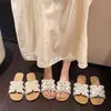 Sandalias planas cómodas estilo hada para mujer, nuevo modelo primavera-verano 2025, sandalias planas para uso exterior, combinan con faldas, dulces zapatos de playa