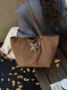 Bolso de Hombro Retro de Gran Capacidad para Mujer 2026 Nueva Moda Bolso de Mujer de Cuero Gamuza Versátil Casual para el Trabajo Bolso de Hombro de Moda