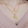 Tienda de Joyería Mismo Estilo Chapado en Oro Accesorios DIY Colgante de Mariposa de Seda Collar para Mujer, Lujo Ligero, Sensación de Alta Gama, Cadena Versátil para la Clavícula