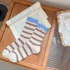 25 Meias Novas de Outono e Inverno Femininas de Meia Panturrilha Coloridas Listradas Caneladas Meias Femininas Japonesas Ins Modernas Casuais Simples Algodão