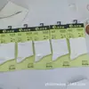Série Xin Shiyu Outono e Inverno Novo Estilo Meia de Algodão Espessa All-In-One de Cano Médio, Meias Lisas de Ponto Duplo Perfumadas, Modernas e Versáteis