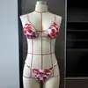 Traje de baño de dos piezas para mujer con estampado de rosas, estilo nuevo europeo y americano 2026, con amarre, Bikini sexy floral transfronterizo de cintura baja