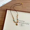 Collar Colgante de Piedra Ojo de Tigre Retro para Mujer 2025 Nuevo Lujo Accesible Cadena de Suéter de Gama Alta Accesorios Otoño e Invierno Maillard