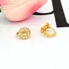 Nuevos Pendientes Frescos de Moda y Dulces Estilo Coreano con Estrella Hueca Microincrustada de Circonita, Lujo Ligero y Sensación de Alta Gama