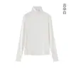 La nueva colección de otoño e invierno de Dirolan presenta una camiseta interior básica de cuello alto, una camiseta interior clásica versátil de color liso de cachemir mousse, hecha a medida para mujer