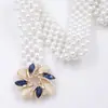 Cinturón decorativo para mujer versión coreana de Joker cadena de cintura de perlas con diamantes de imitación cadena de cintura elástica de verano para mujer venta al por mayor directa de fábrica