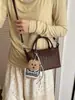 Bolsa de mão tecida de alta qualidade transfronteiriça para mulheres, nova super popular outono 2026, bolsa de ombro e transversal para o dia a dia