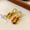 Pendientes de Flor Leopard Print Manchado de Resina Aguja de Plata Otoño e Invierno Maillard Retro Moda Pendientes de Nicho de Gama Alta