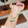 Collar de Cadena Larga de Lana Elegante Versátil de Moda Retro con Borla Letra Calavera de Calabaza Lujo Ligero Nicho Exquisito para Mujer