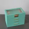 Nuevo cajón de hardware de alta gama caja de joyería de cuero PU fabricantes de Jinhua caja de joyería con ventana de 4 capas espejo de tocador incorporado
