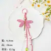Exquisitos colgantes de libélula tejidos a mano con cuentas, decoraciones para bolsos y accesorios disponibles para venta al por mayor directamente del fabricante.