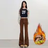 Otoño Invierno Nuevos Pantalones Casuales de Pana para Mujer Elásticos Merade Ajuste Delgado Versátiles Acampanados Largos Yi Chun