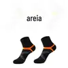 Meias de algodão de borracha de comércio exterior masculino de cor sólida transfronteiriça meias de tubo esportivo de basquete por atacado meias cinza preto e branco masculino