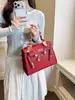 Bolso de mujer de nicho de alta gama 2026 nuevo de primavera vintage versátil bandolera bolso de mano versátil casual bolso tipo Kelly